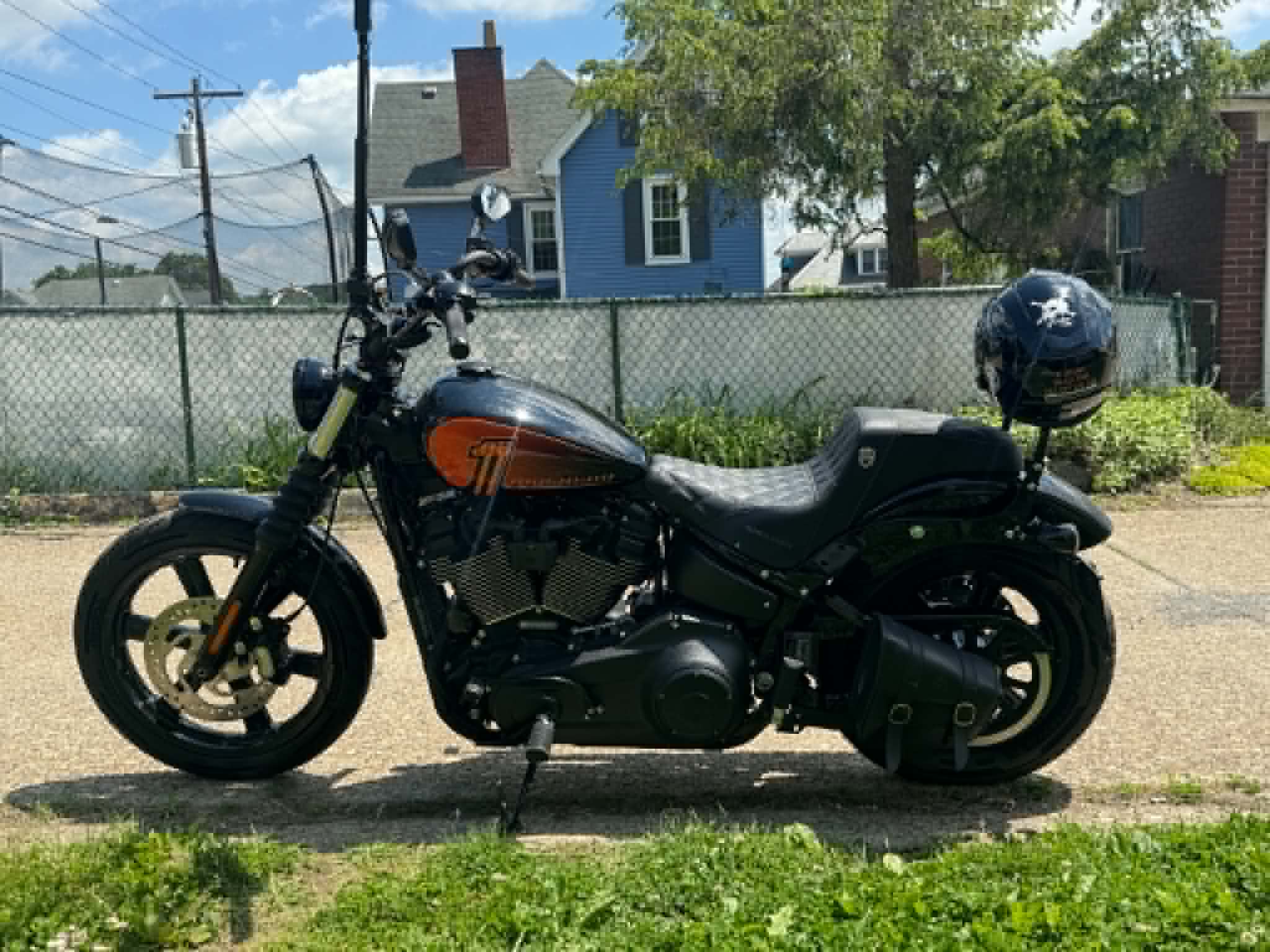 Black and orange motorcycle serviced by Classic Rods